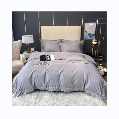 China Solid Color Anti-static Hot Selling Ice Silk Amazon Embroidery Sheet Bedding Set For Home for sale