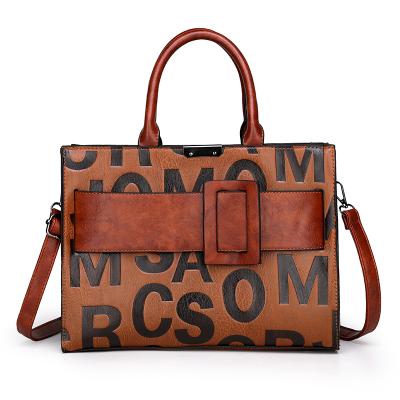 China Fashion Designers Fashion Custom Logo Wholesale Luxury Purses And Handbags For Women for sale