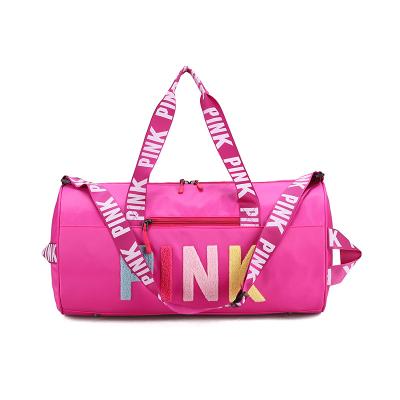 China 2021 fashion large capacity duffle sports bag custom logo women sports pink cross - body duffle pink gym bag for girls gym for sale