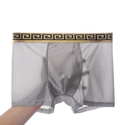 China Summer Anti-static Ice Silk Mesh Men's Large Size Boxers Breathable Mid Waist Flat Wedge Underwear for sale