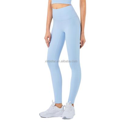 China New breathable peach buttocks no bare waistline yoga sports t-line 2021 pants high tight women's gaiters cropped pants for sale