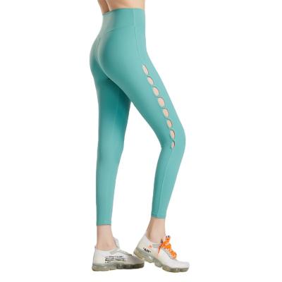 China New Design Hollow Hole Fitness Breathable Women Pants Running Sports Nine Point Tights Lift Up Hip Yoga Gaiters KW24 for sale