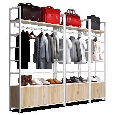 China Mordern Wholesale Wooden Boutique Clothing Hanging Display Racks With Shelves For Cloth Shops for sale