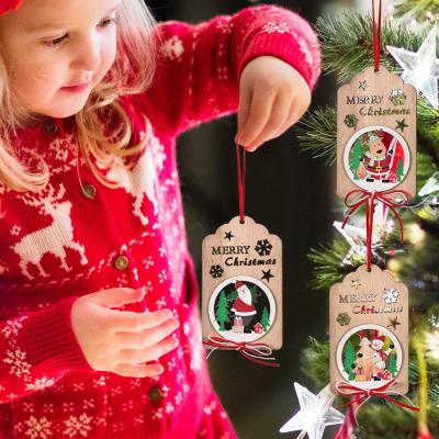 China HB-320 Eco-friendly Christmas Wooden Hanging Ornaments Hollow Santa Snowman Wooden Pendants for sale