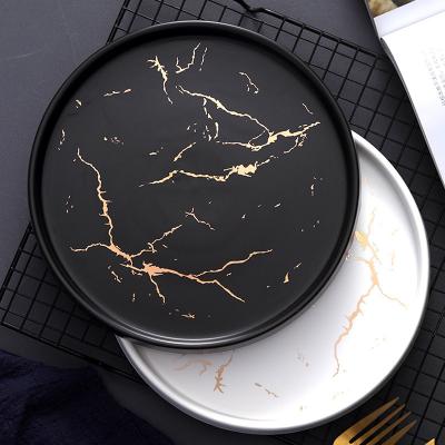 China Restaurant Disposable High Quality Home Matte Round Marble Dishes Ceramic Wedding Gold Charger Custom Made for sale