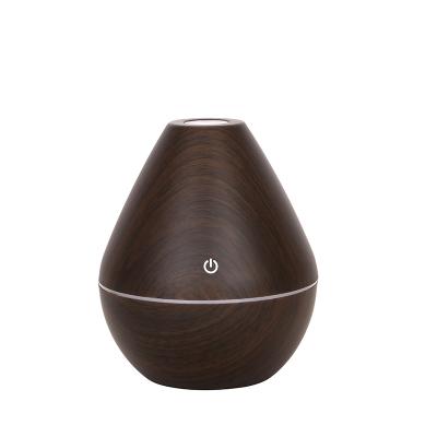 China Hotel Drop Shipping Ultrasonic Humidifier Factory Hit 2022 Wooden Grain 130ml Mini Humidifier With Changing Led Night Light for sale