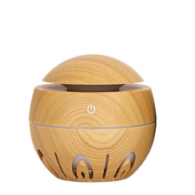 China Hotel Drop Shipping USB Mini Mushroom Wood Grain Diffuser With Hollowed Out Cool Mist Humidifier for sale