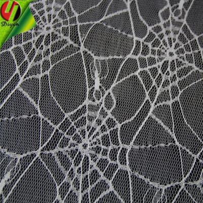 China Halloween Cheap100% Polyester Lace Fabric Anti-static Spider Web for sale