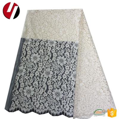 China Viable Wholesale Cheap White Dry Lace Fabrics African Cotton for sale