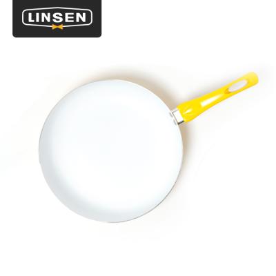 China Minimalist Yellow Enamel 304 Stainless Steel Nonstick Cookware Cookware Set Frying Pans Coating Pan for sale