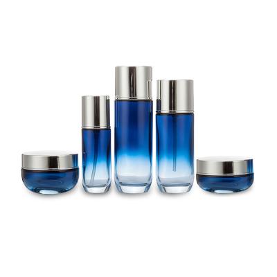 China Luxury Aluminum Cosmetic Packaging Jars Empty Glass Bottles Pump Up Containers For Skin Care Bottle Set for sale