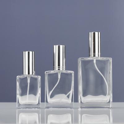 China 50ml 100ml cosmetic high quality glass spray empty perfume bottle for man for sale