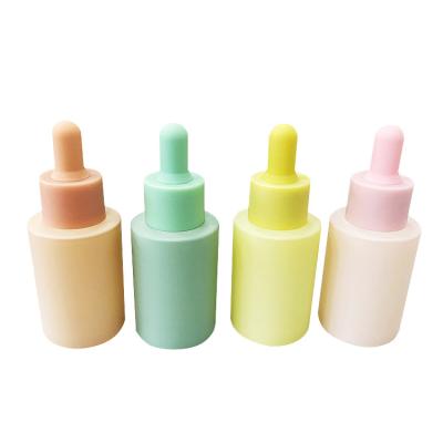 China Matte Pink Blue Green Yellow Serum Dropper Shoulder 30ml Cosmetic Flat Color Macaroon Glass Bottle for sale