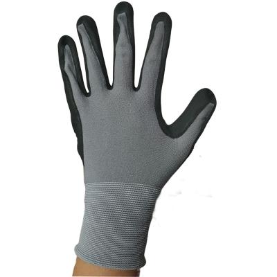 China Anti-smash Best Seller Design Sfg-Dq709Bd Waterproof Nitrile Coated Gloves for sale