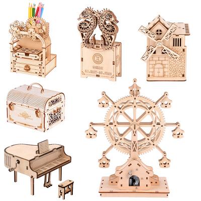 China Safety DIY Operate Wooden Puzzle Music Treasure Box Hand Crank Engraved Small Gifts Love Mini Lovely Keepsake Musical Box Melody Couples Gifts for sale