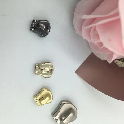 China Low price clothes metal slider wholesale nickel free zipper main head head zinc alloy head for sale