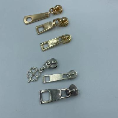 China Nickel-Free High quality golden silver zipper puller is suitable for all kinds of luggage zipper for sale