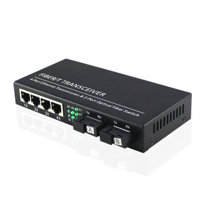 China SBS 10/100/1000M Singlemode 2 Fiber 4 Ethernet Fiber RJ45 Singlemode 20KM Fiber Media Converter for sale