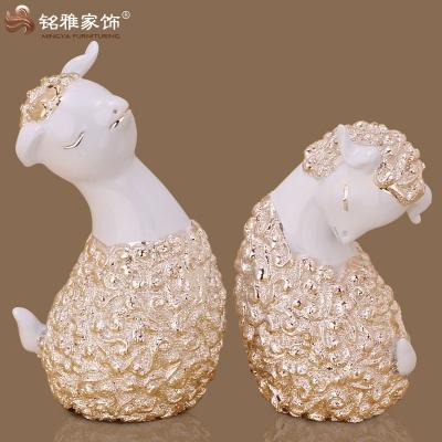 China Nice Decoration Gift/Christmas Gift etc. for Child Resin Statues Couples Sheep Small Study Room Table Decoration for sale