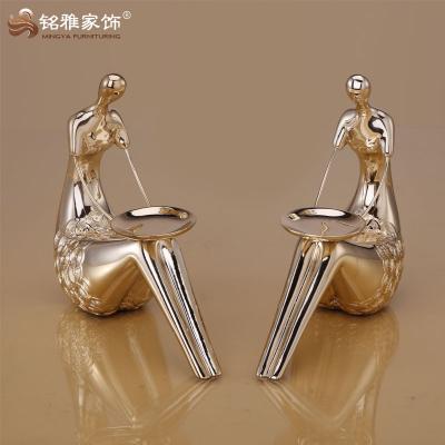 China Weddings Wholesale Resin Crafts Plating Rose Gold Candle Holder For Home Decor for sale