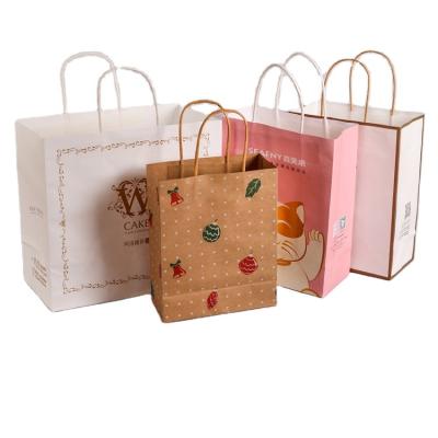 China Recycled Materials China Cheap Takeaway Package Bags Kraft Paper Boutique Cute Paper Shopping Bag for sale