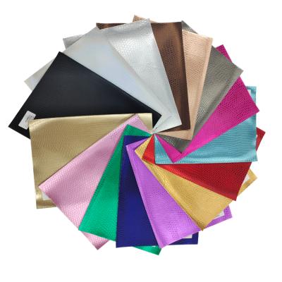 China Waterproof Smooth Stone Texture Woven PVC Film PU Synthetic Leather New Fashion Backing For Shoes And Bags for sale