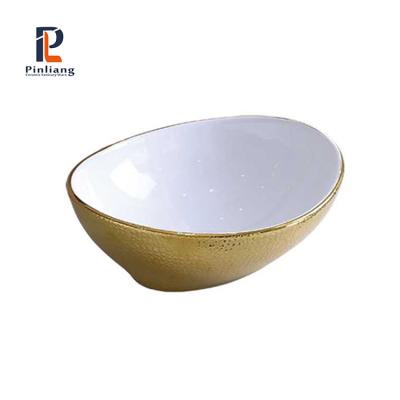 China Gold Handmade Scratch Proof Art Basin Luxury Gold Oval Basin Countertop Basin Bathroom Gold Ceramic Sinks for sale