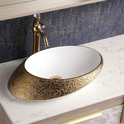 China Easy Clean Wash Hand Basin Luxury Bathroom Sink Sinks Ceramic Counter Top Bathroom Sink Gold for sale