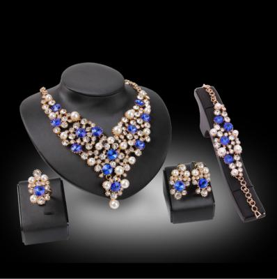 China Unique TRENDY Crystal Bridal Wedding Gift Jewelry Sets For Ladies Necklace Earrings Rings Bracelet Four Piece Set Accessories for sale