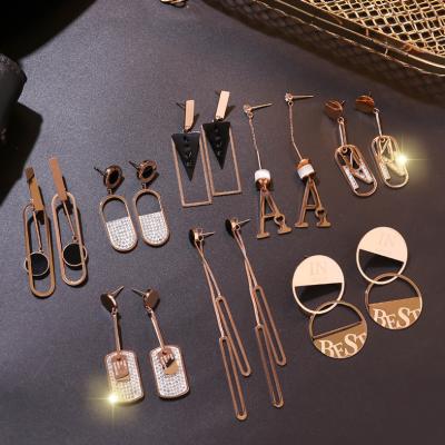 China FASHIONABLE new charm long tassel pendant rose gold earrings geometric titanium steel earrings jewelry for women for sale