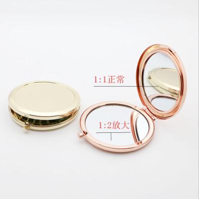 China Solid Color Magnifying Metal Round Case Pocket Mirror Beauty Accessories Double Side Auto Mirror for sale