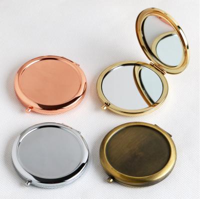 China Custom Double Side Magnifying Rose Gold Portable Compact Round Case Metal Makeup Mirror Pocket Mirror Automatic Beauty for sale