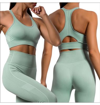 China New European and American antibacterial simple antibacterial seamless body yoga clothes women's sports bra hollowed out beautiful back tight running pants S for sale