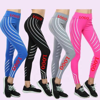 China Women Fitness Yoga Leggings Breathable Fashion Reflect Stripe Tummy Control Sportswear Slim Sportswear Tracksuit for sale