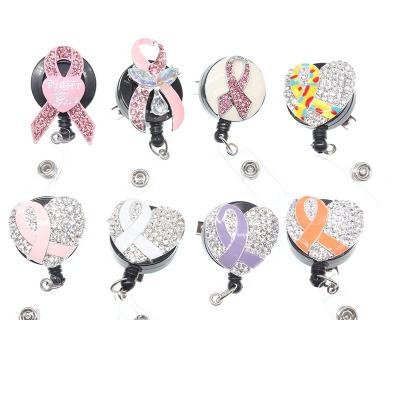 China Popular New Breast Cancer Awareness Ribbon Retractable Nurse ID Badge Holder Reel for sale