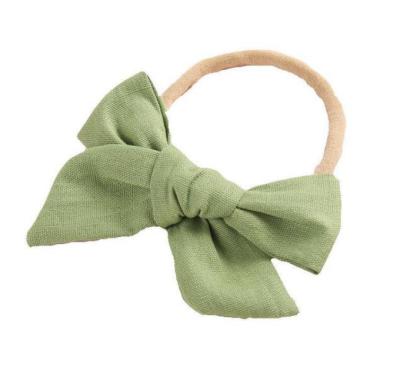 China Environmentally Friendly Children's Wick Cotton Windmill Styling Bow Headband Baby Solid Color Infant Super Soft Headband for sale