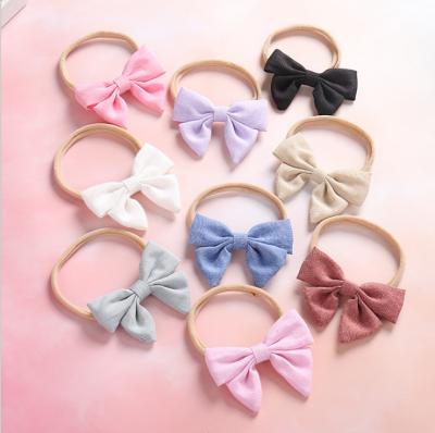 China Environmentally Friendly Cute Multicolor Cute Baby Hair Bow Nylon Hair Band Headband for sale