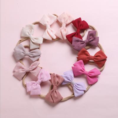 China Environmentally Friendly Cute Multicolor Cute Baby Hair Bow Nylon Hair Band Headband for sale