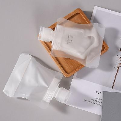 China Custom Plastic Cosmetic Pouch Flip Top Spout Pouch Matte Transparent Sample Small Sachet Flip Top Cap Stand Up Barrier Wholesale for sale