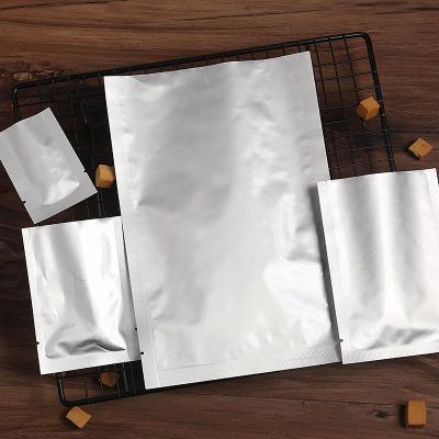 China Cantainers Recyclable Vavuum Aluminum Foil Bag Storage Food Packaging Bags Ribbon Sealing Pouch for sale