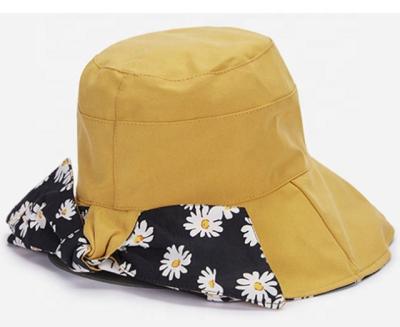 China Fashion Striped Wide Brim Daisy Bowknot Women Summer Travel Bucket Hat Sun Protection Beach Fisherman Hat Packable Hat for sale