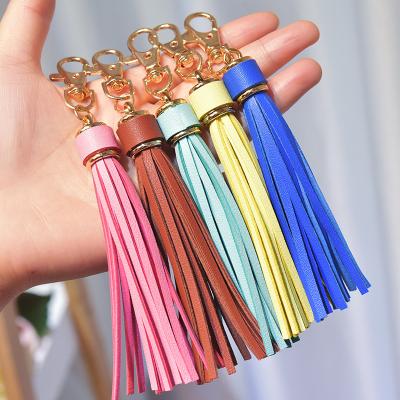 China Multicolor Faux Tassel PU Promotion Key Chain Pendant Environmental Friendly Leather Handbag Accessory With Gold Metal Hook Gifts For Girls for sale