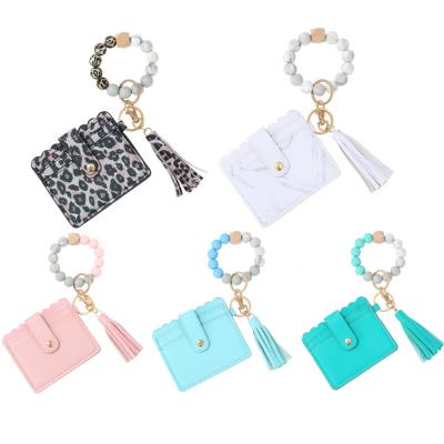 China Amazon Leopard Leather Popular Environmental Friendly Personalized Custom Key Chain Wallet With Lip Holder Wristband Key Ring Leopard Cards Case For Women for sale