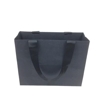 China Disposable Black Cardboard Personalize Paper Shopping Bag With Your Own LOGO In Gold Foil for sale