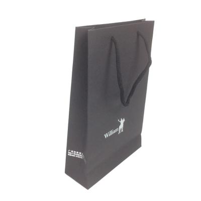 China Color Printing Luxury Clothing Recyclable Shopping Gift Black Paper Bag With Handle for sale