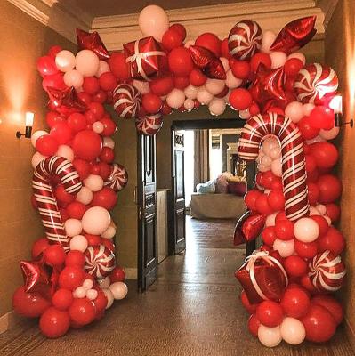 China Toy Christmas Balloon Garland Arch Kit 142 Pcs Promotional Christmas Red Star Balloons Candy Balloons Red White Gift Box for sale