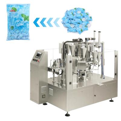 China Food Automatic Small Bag Into Large Bag Packing Machines Premade Bag Doypack Filling And Sealing Machine for sale