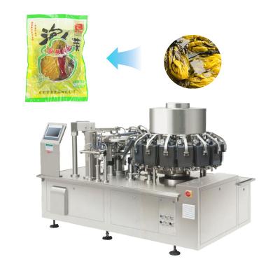 China Food Automatic Rotary Premade Bag Filling And Sealing Packaging Machines Thermoforming Vacuum Packing Machine for sale