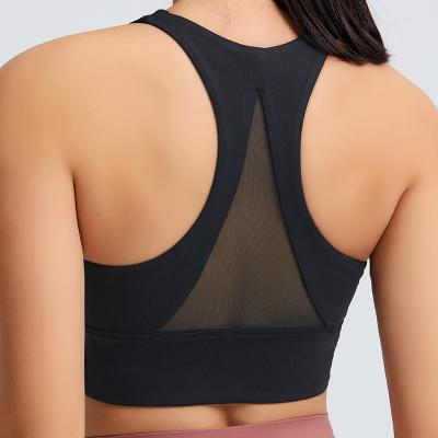 China 2021 Antibacterial Mesh Workout Women Fitness Sports Bra Crop Tops Stitching Brushed Yoga Bra for sale