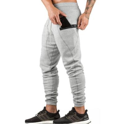 China 2020 Antibacterial Sports Autumn Men Fitness Drawstring Workout Gym Pants Joggers Sweatpants With Pockets for sale